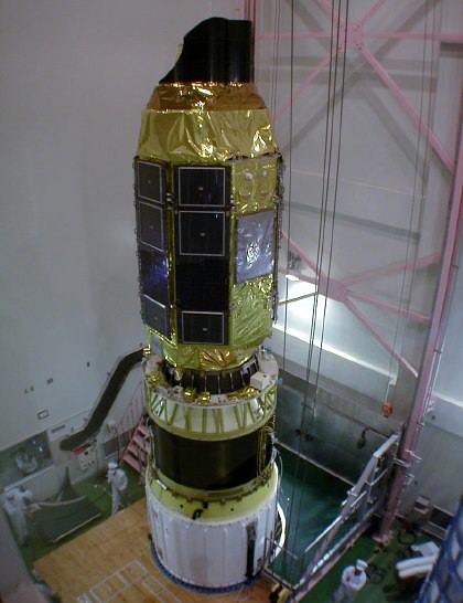 ASTRO-E looking small compared to the third stage (49K JPEG)