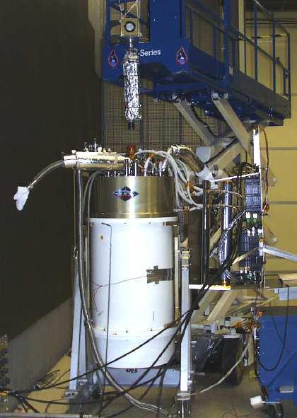 Bottom-up view of the foil-wrapped X-ray source aimed at the test Dewar (32K JPEG)